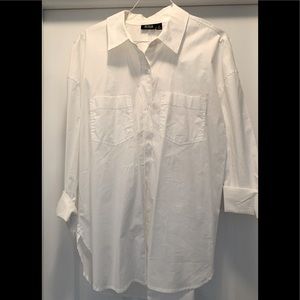 Woman’s oversized button down shirt